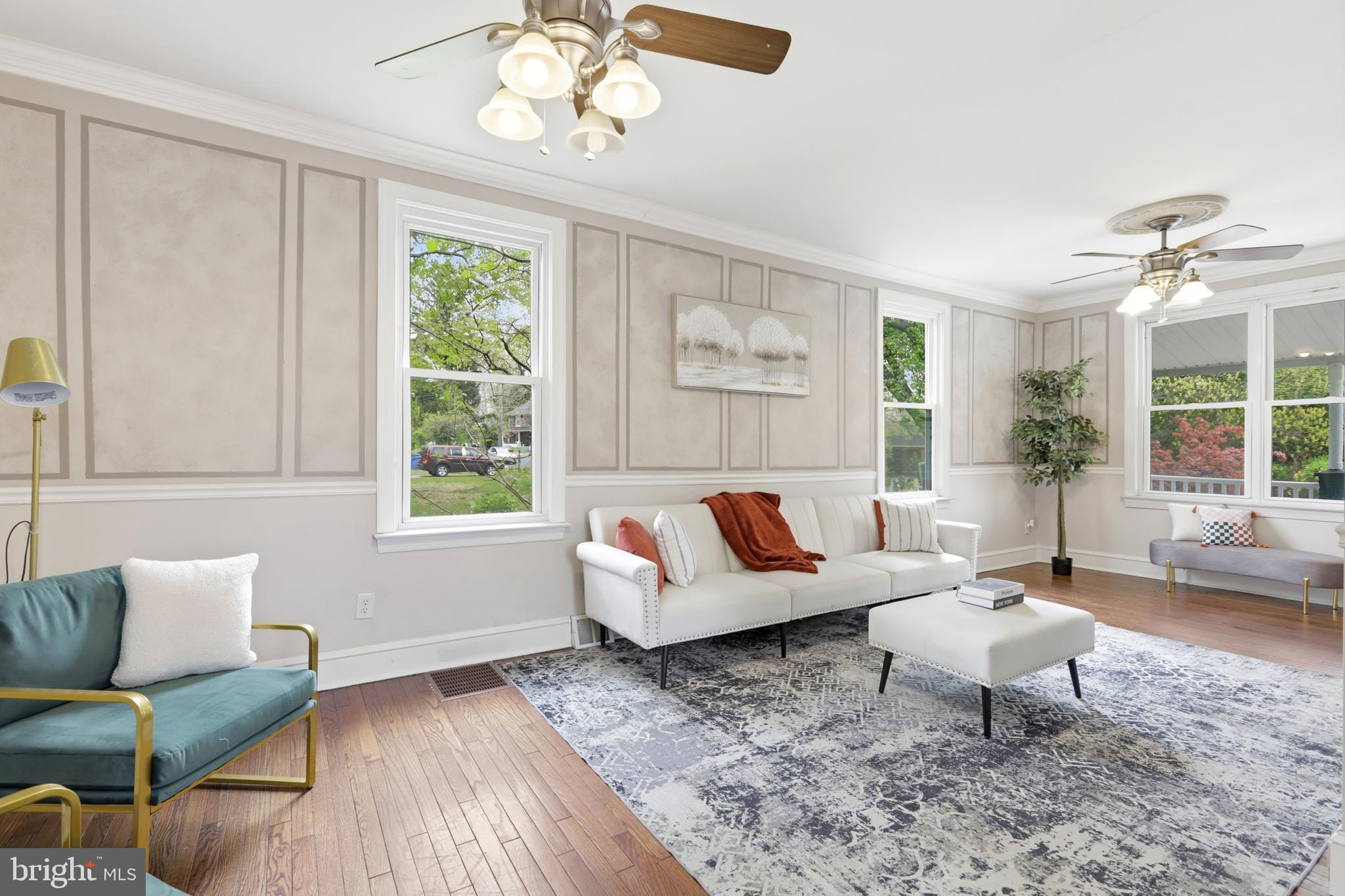 718 Chestnut Avenue Laurel Springs, NJ 08021 - Photo 6 of 49 a living room with furniture a table and a large window