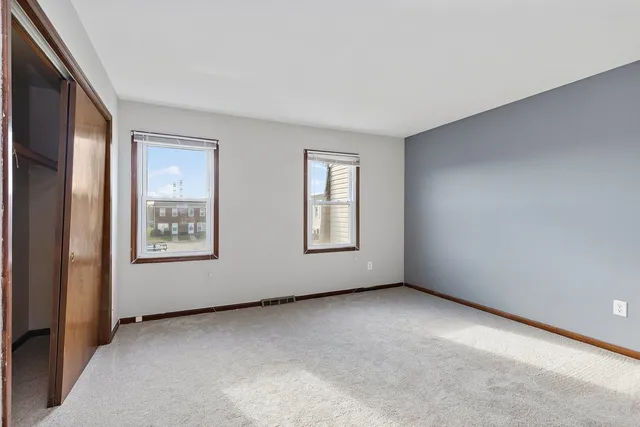 an empty room with windows