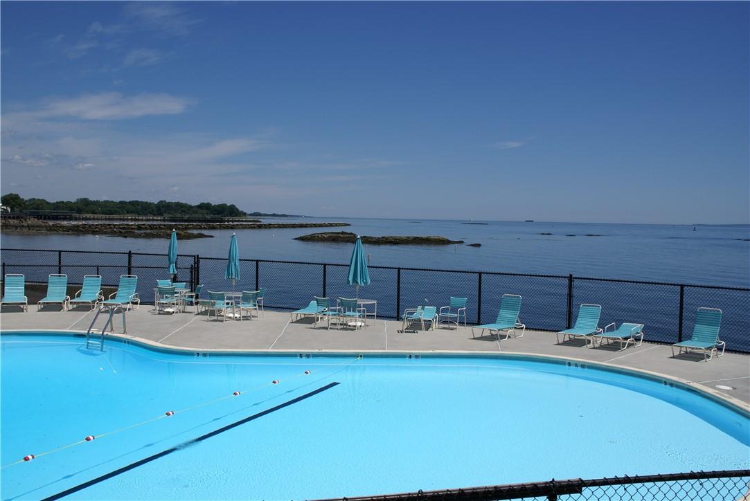 41 Waters Edge Rye, NY 10580 - Photo 1 of 1 Waters Edge residents enjoy use of a pool overlooking Long Island Sound