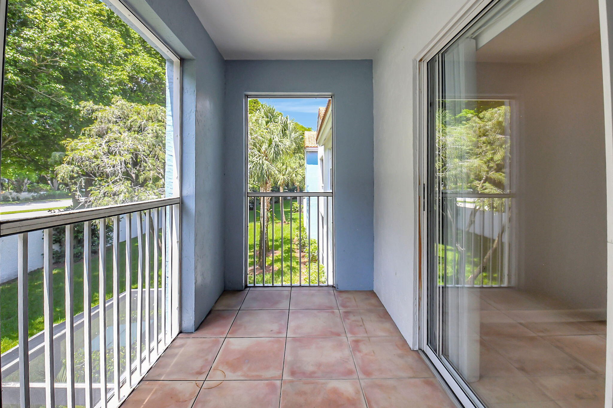 3207 Clint Moore Road, Unit 206 Boca Raton, FL 33496 - Photo 35 of 54 a view of hallway with balcony