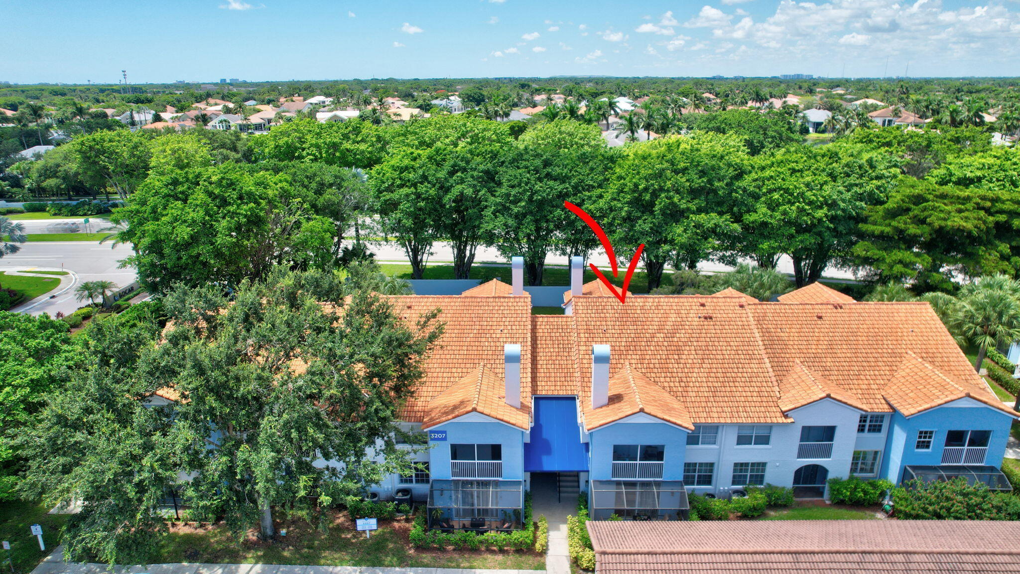 3207 Clint Moore Road, Unit 206 Boca Raton, FL 33496 - Photo 39 of 54 a aerial view of multiple houses with a yard