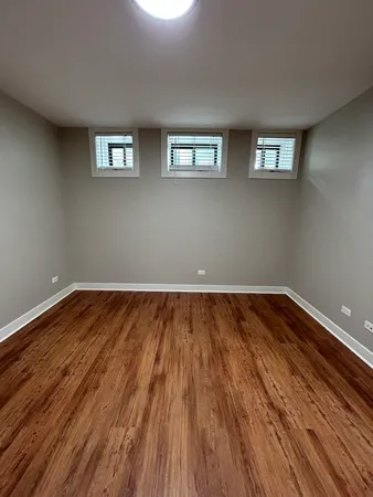 a bathroom with a shower and toilet