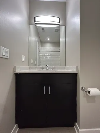 a bathroom with a toilet and a bathtub