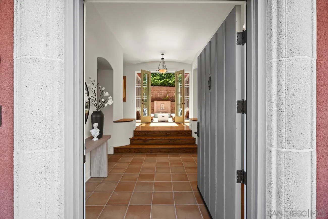 1631 Mimulus Way La Jolla, CA 92037 - Photo 4 of 33 a view of a balcony with furniture and floor to ceiling window