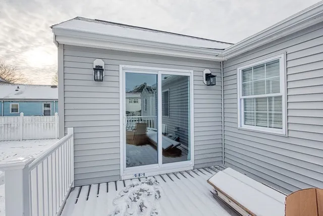 a view of a door and a window