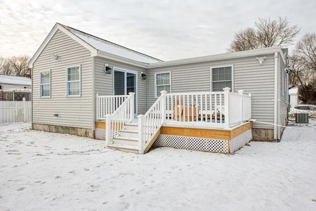 a front view of a house with a outdoor space