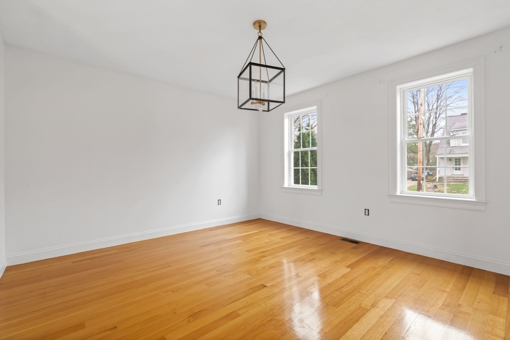 30 Neponset Street Walpole, MA 02071 - Photo 15 of 41 a view of empty room with wooden floor and fan