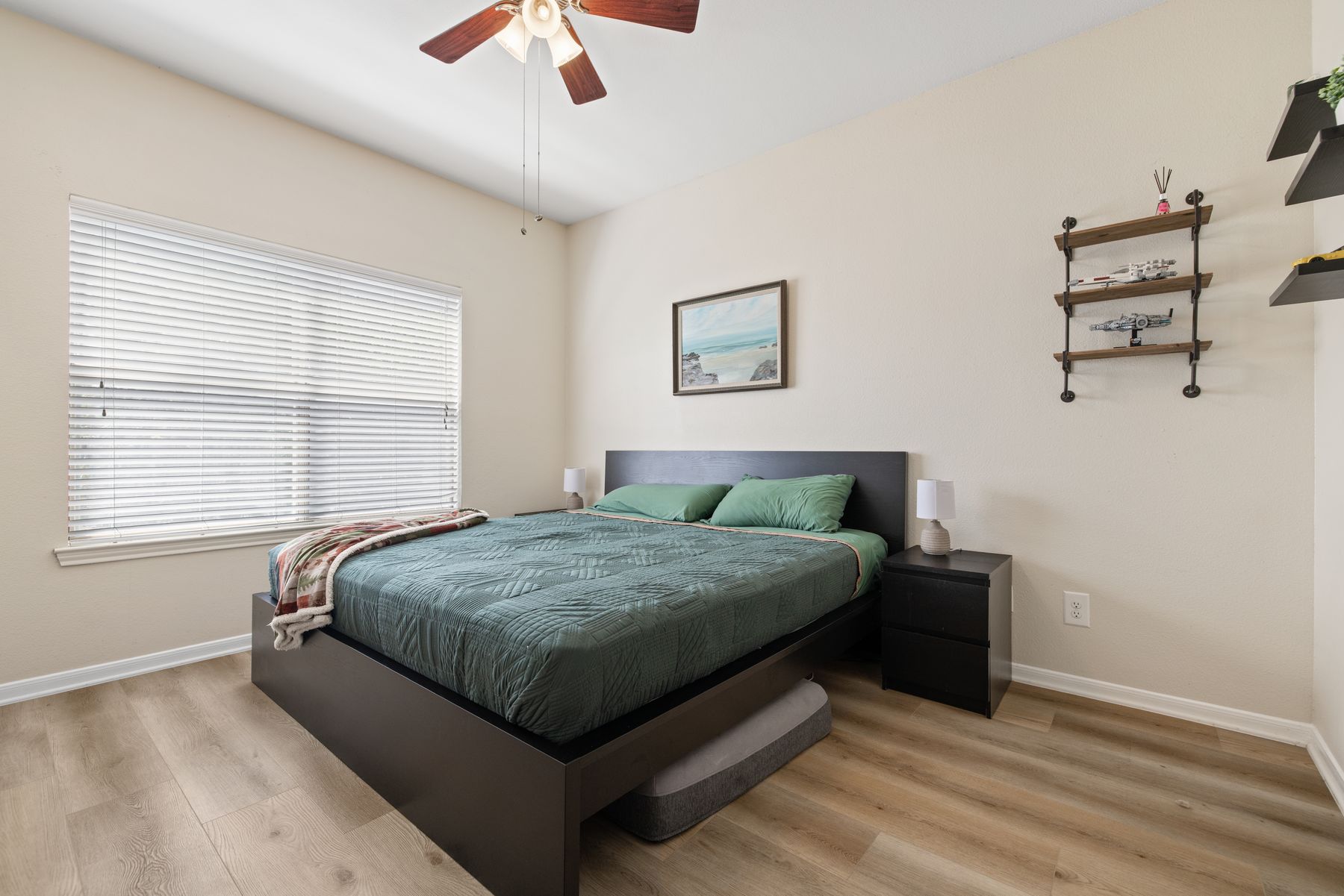 6000 Shepherd Mountain Cove, Unit 302 Austin, TX 78730 - Photo 14 of 22 a bedroom with a bed and dresser