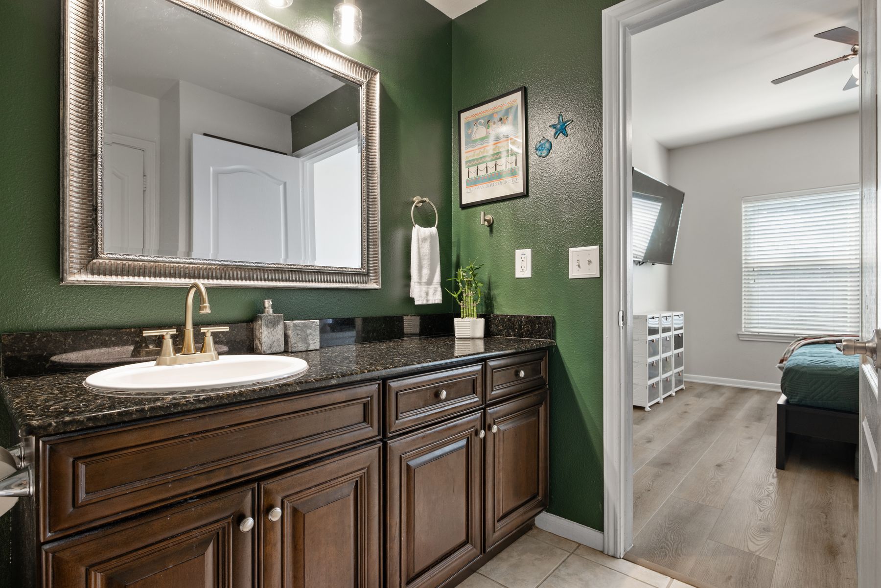 6000 Shepherd Mountain Cove, Unit 302 Austin, TX 78730 - Photo 17 of 22 a bathroom with a sink and a mirror