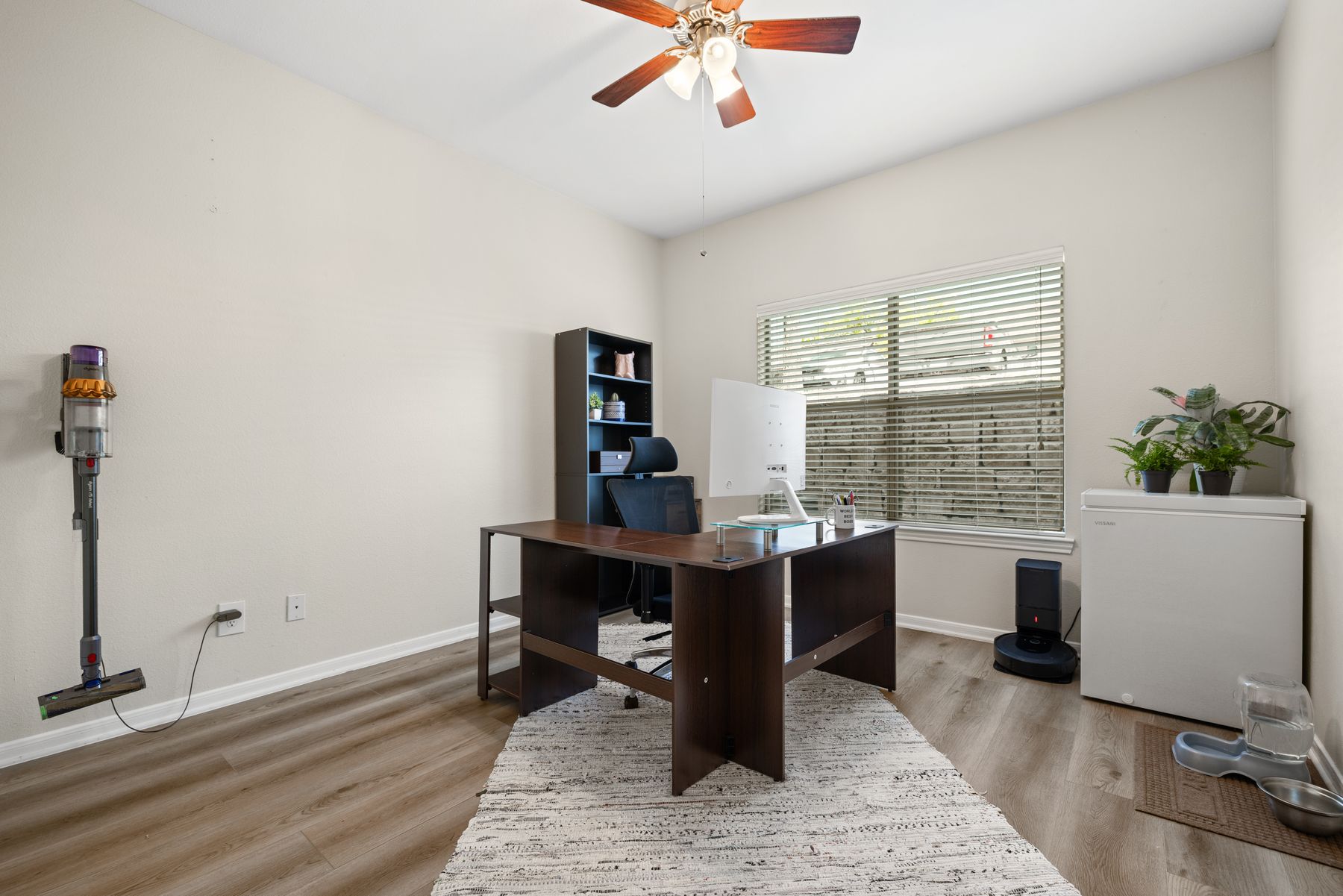 6000 Shepherd Mountain Cove, Unit 302 Austin, TX 78730 - Photo 19 of 22 a view of a workspace with furniture and a window