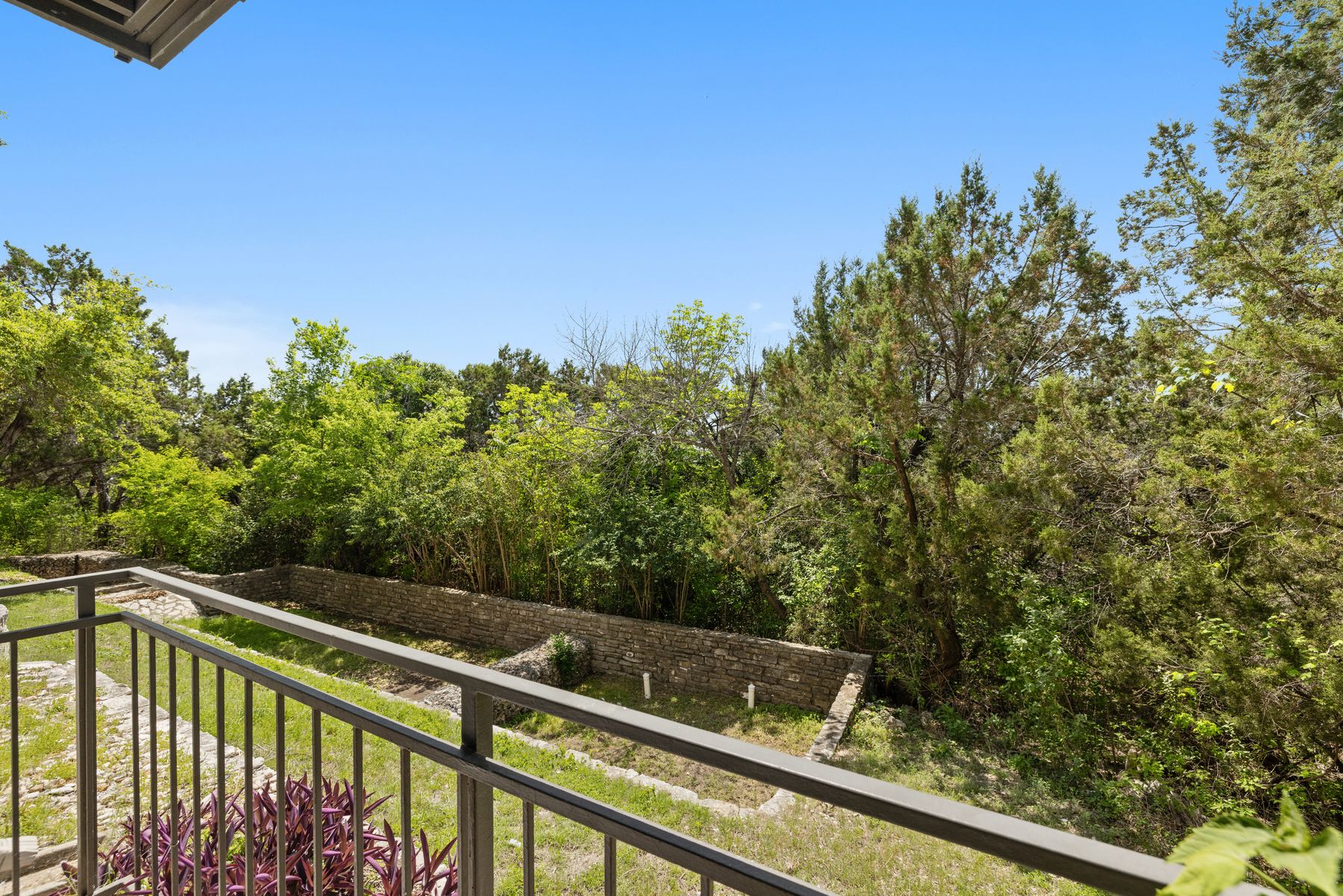 6000 Shepherd Mountain Cove, Unit 302 Austin, TX 78730 - Photo 22 of 22 a view of balcony and yard