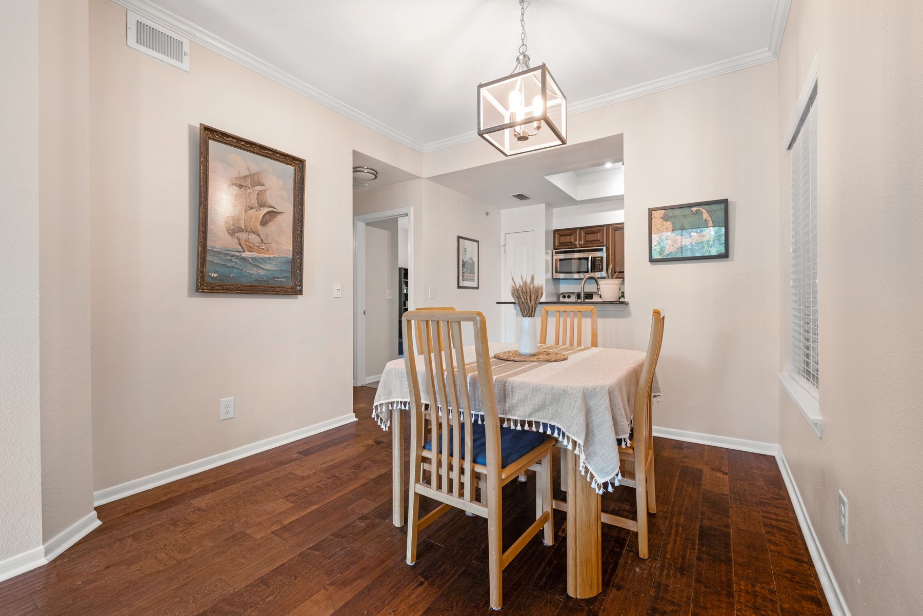 6000 Shepherd Mountain Cove, Unit 302 Austin, TX 78730 - Photo 9 of 22 a view of a dining room with furniture and wooden floor