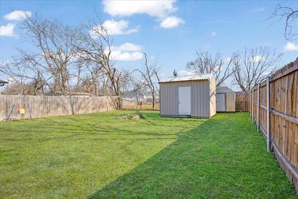 a view of a backyard with a garden