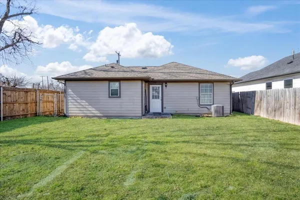 a view of a backyard with garden