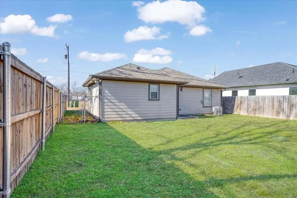 a view of a backyard with a garden