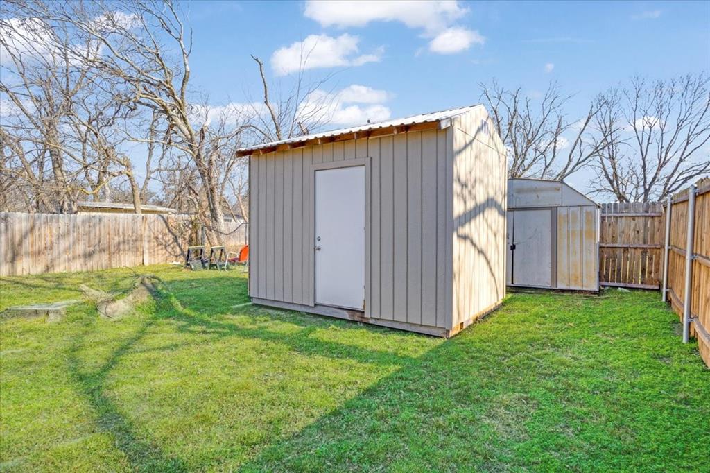 307 North Carter Street Howe, TX 75459 - Photo 28 of 31 a view of a backyard with barn