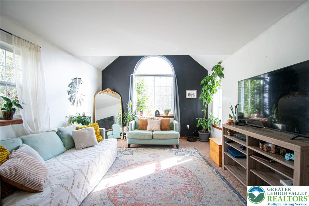 160 Grassy Road Kunkletown, PA 18058 - Photo 11 of 44 a living room with furniture and a flat screen tv