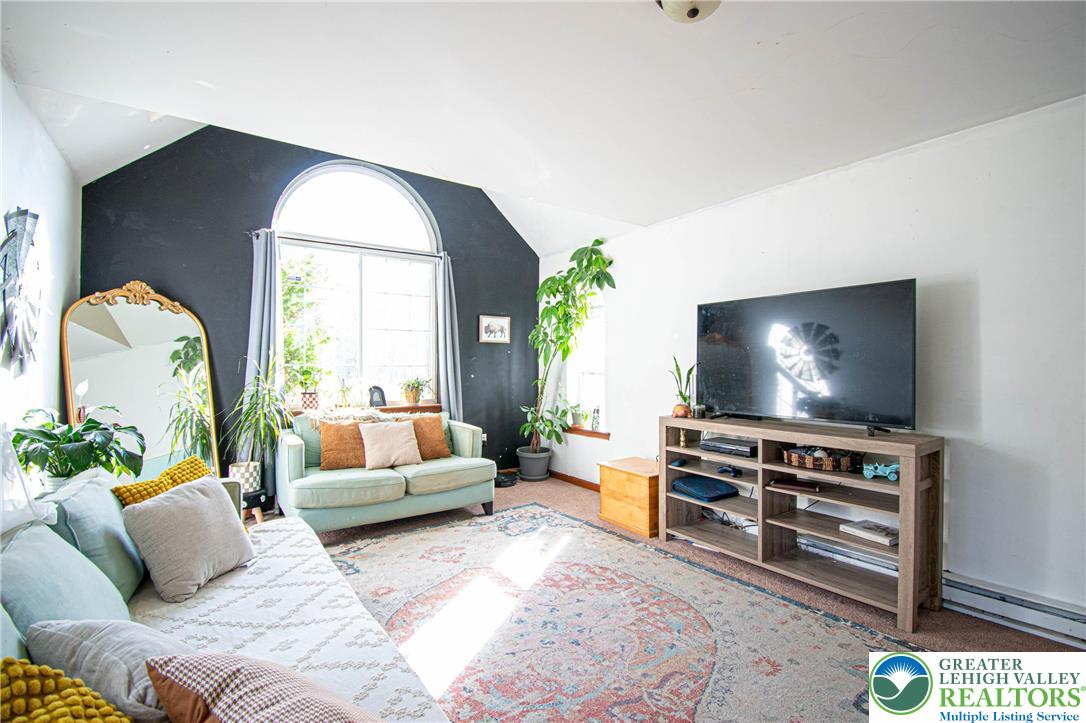 160 Grassy Road Kunkletown, PA 18058 - Photo 12 of 44 a living room with furniture and a flat screen tv