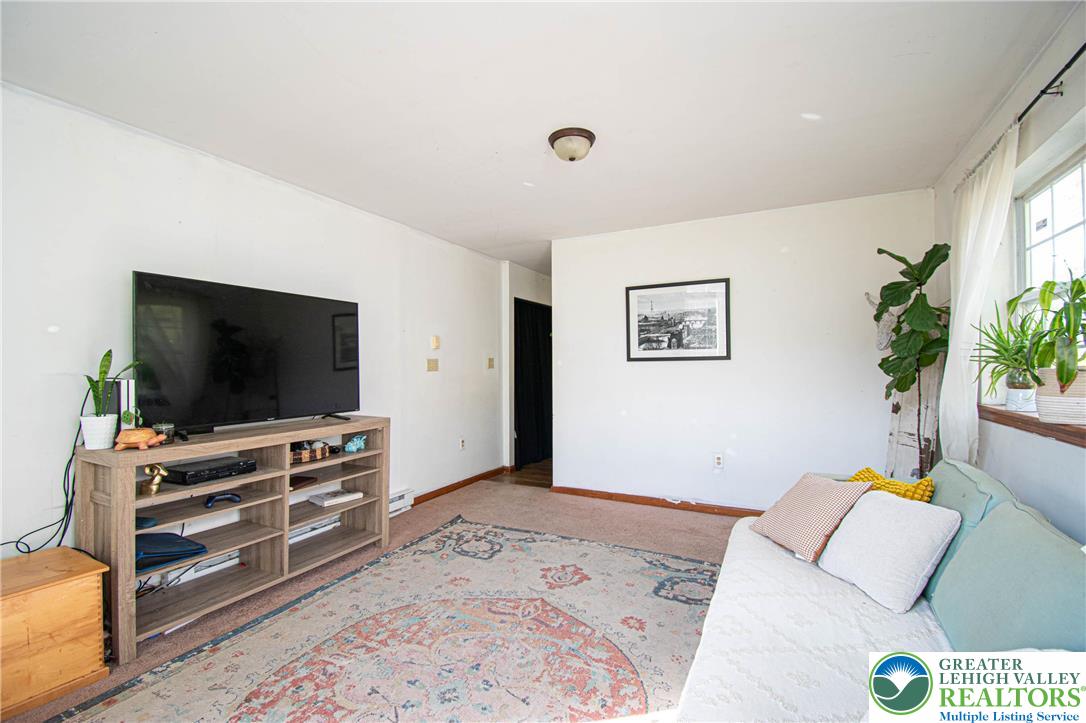 160 Grassy Road Kunkletown, PA 18058 - Photo 13 of 44 a bedroom with furniture and a flat screen tv