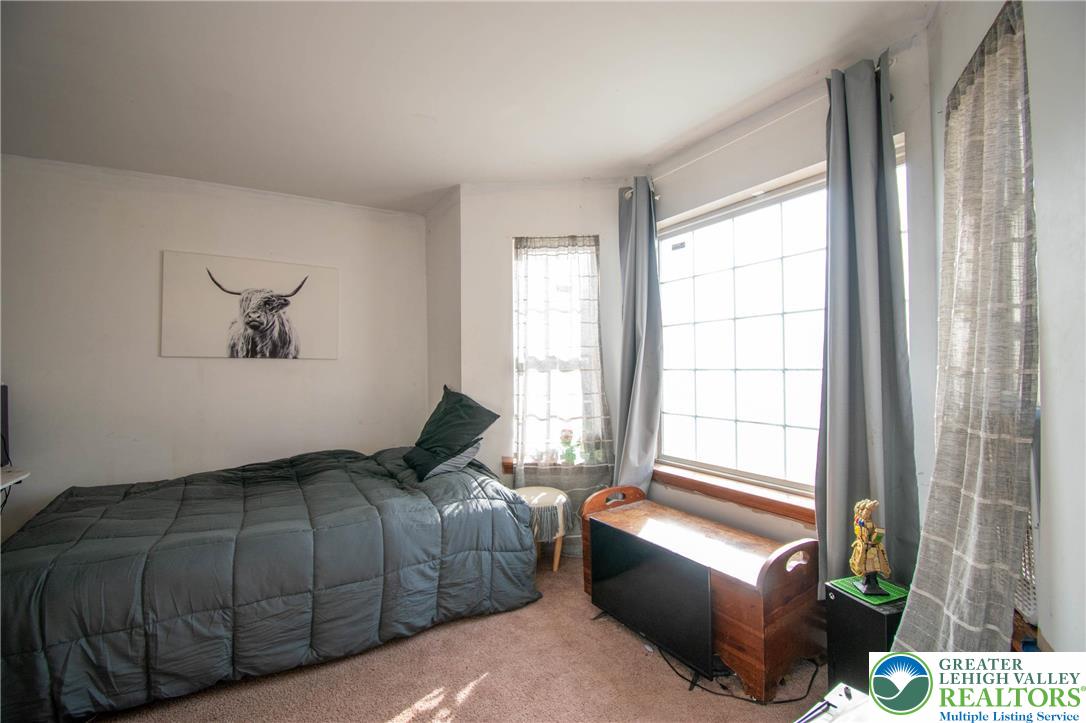 160 Grassy Road Kunkletown, PA 18058 - Photo 16 of 44 a bedroom with a bed and a window