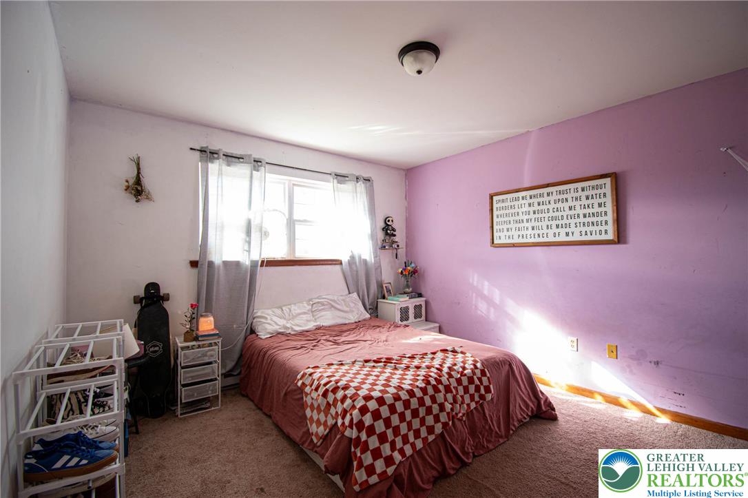 160 Grassy Road Kunkletown, PA 18058 - Photo 28 of 44 a bedroom with a bed and a window
