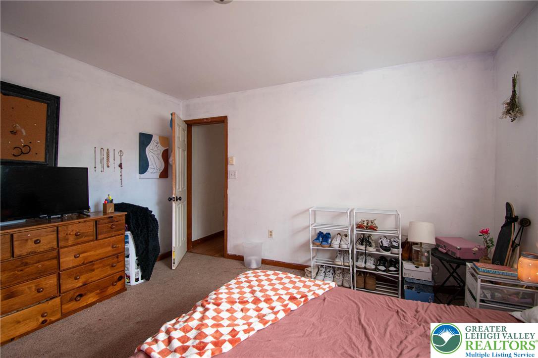 160 Grassy Road Kunkletown, PA 18058 - Photo 30 of 44 a bedroom with furniture and flat screen tv