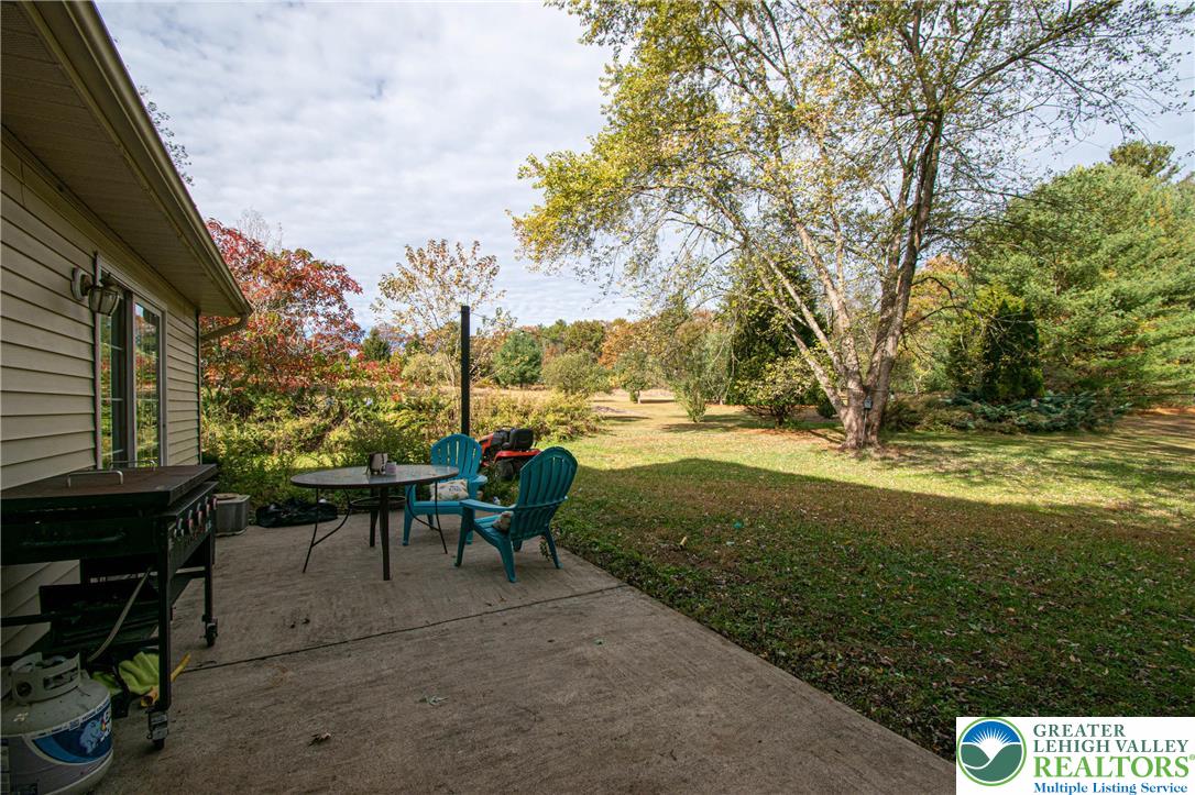 160 Grassy Road Kunkletown, PA 18058 - Photo 31 of 44 a view of a garden with lawn chairs