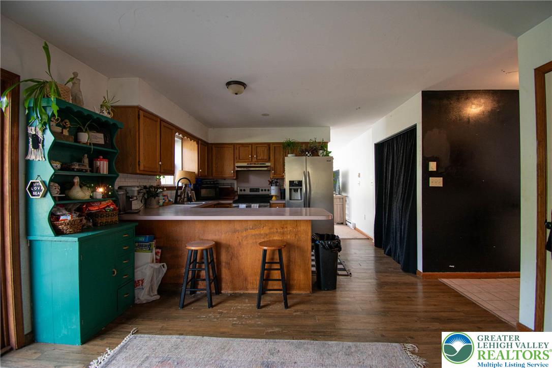 160 Grassy Road Kunkletown, PA 18058 - Photo 6 of 44 a large kitchen with a lot of counter space and stainless steel appliances
