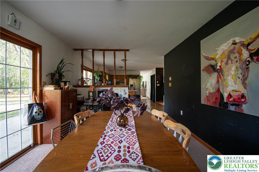 160 Grassy Road Kunkletown, PA 18058 - Photo 9 of 44 a bed room with a bed tv and a large window