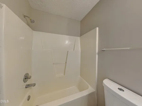 a close up of a bathtub in a bathroom