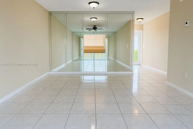 a view of an empty room and window