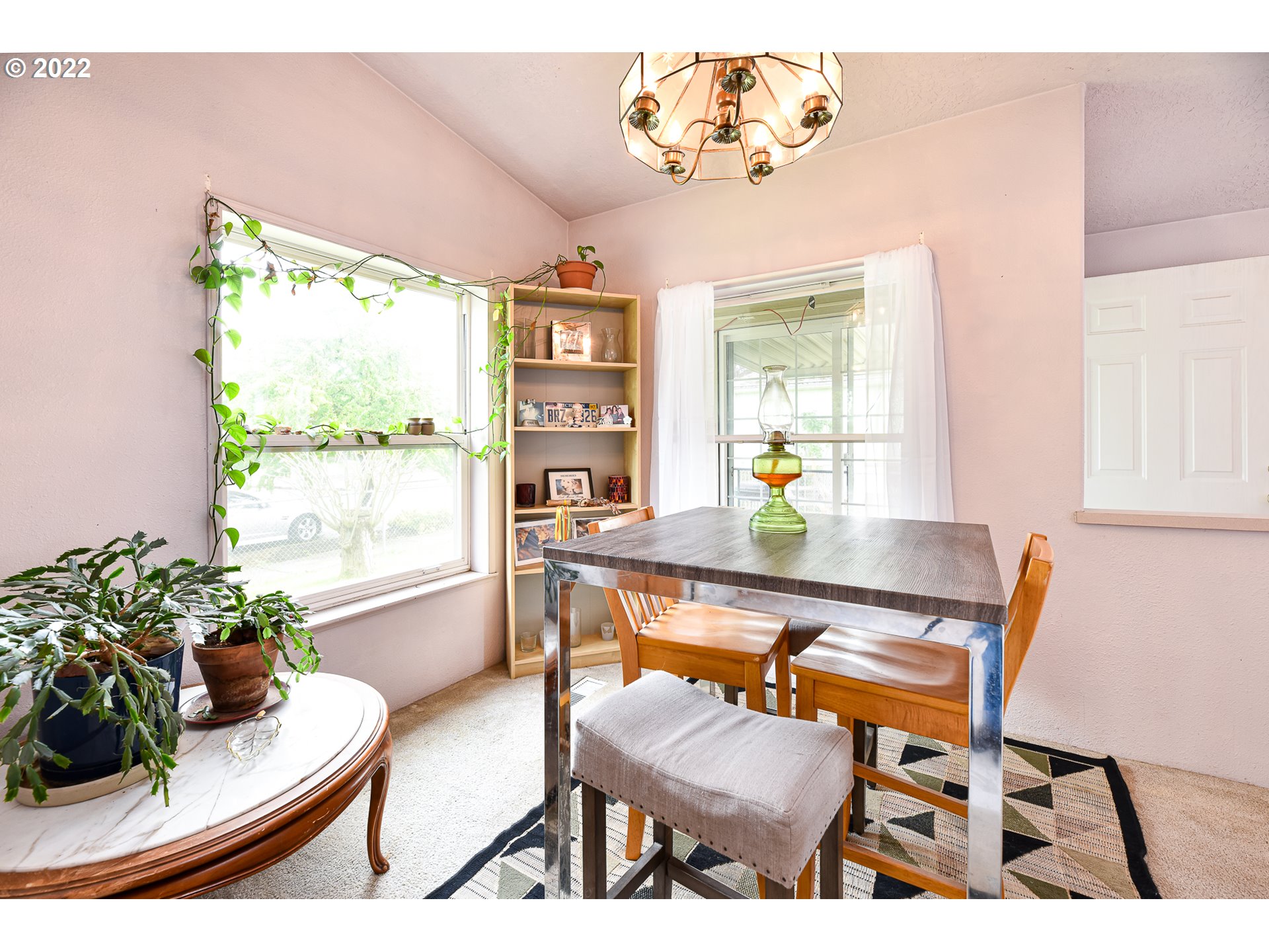 1151 T Street Springfield, OR 97477 - Photo 15 of 32 a view of a dining room with furniture window and outside view