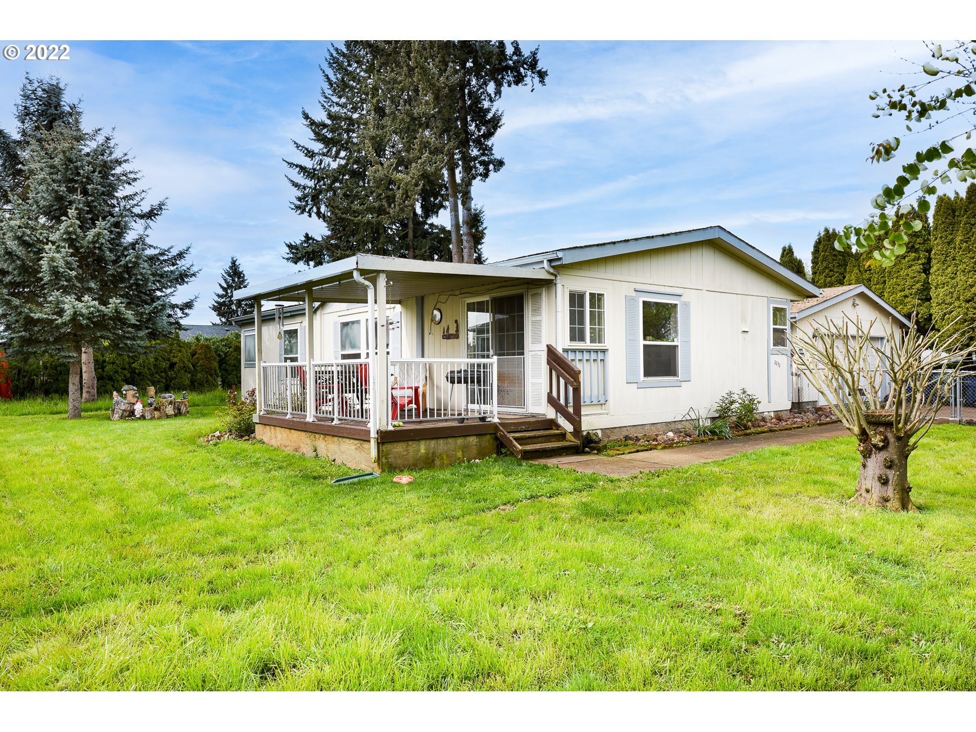 1151 T Street Springfield, OR 97477 - Photo 3 of 32 a view of a house with backyard and sitting area