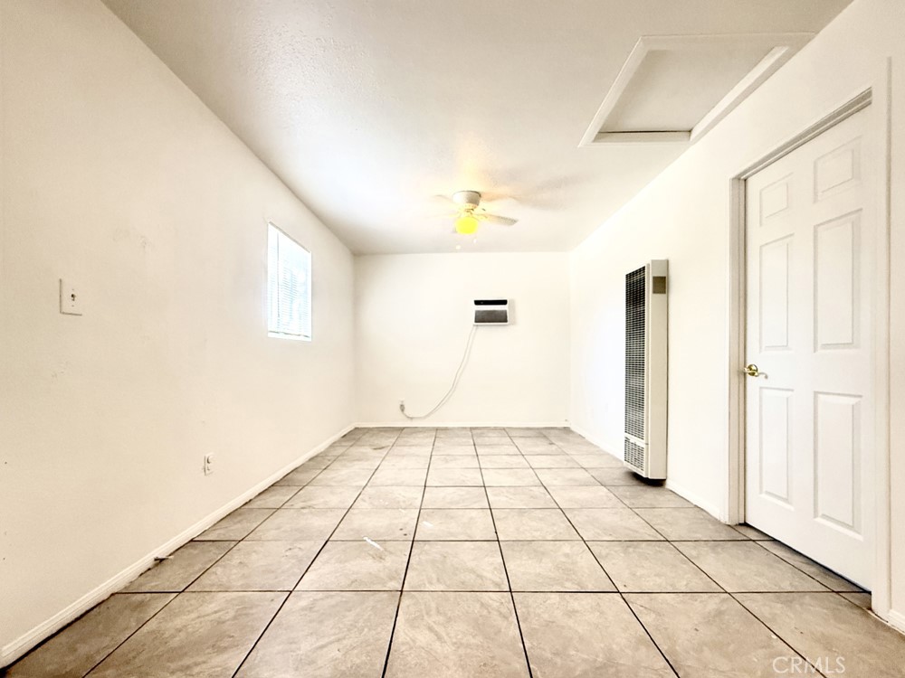 974 Grand Colton, CA 92324 - Photo 2 of 9 a view of an empty room and window
