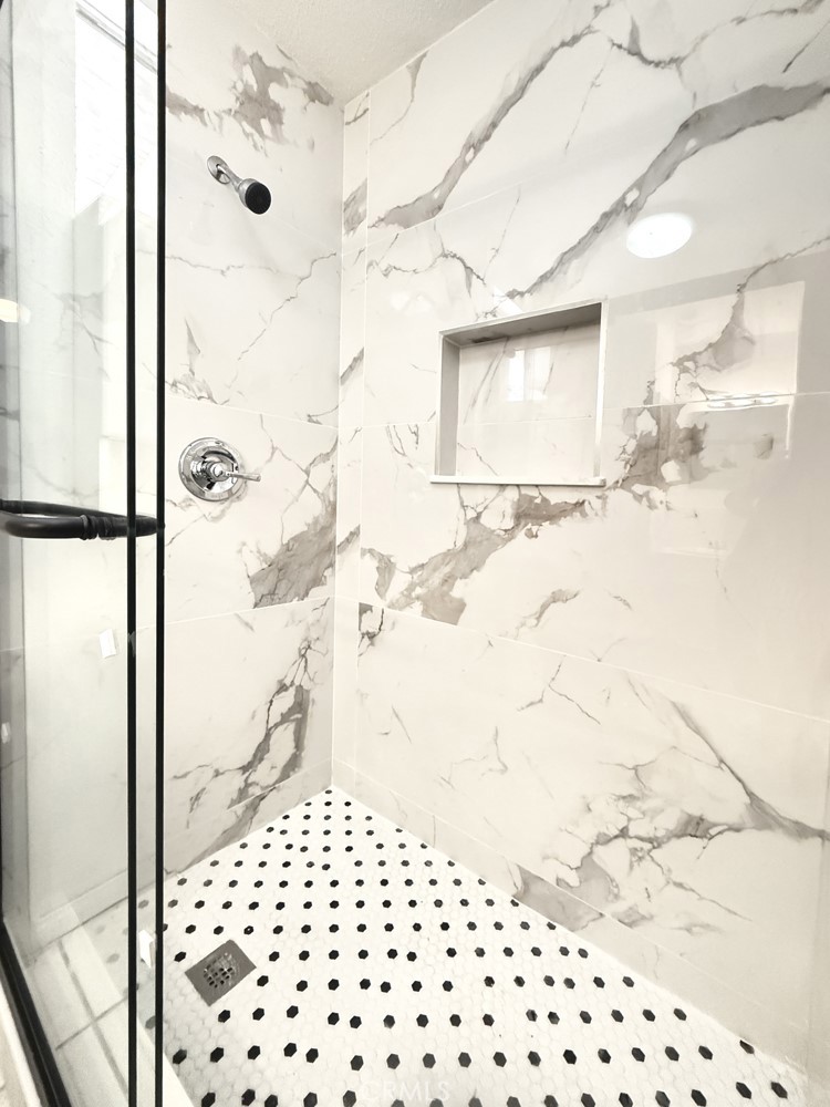 974 Grand Colton, CA 92324 - Photo 7 of 9 a bathroom with a shower