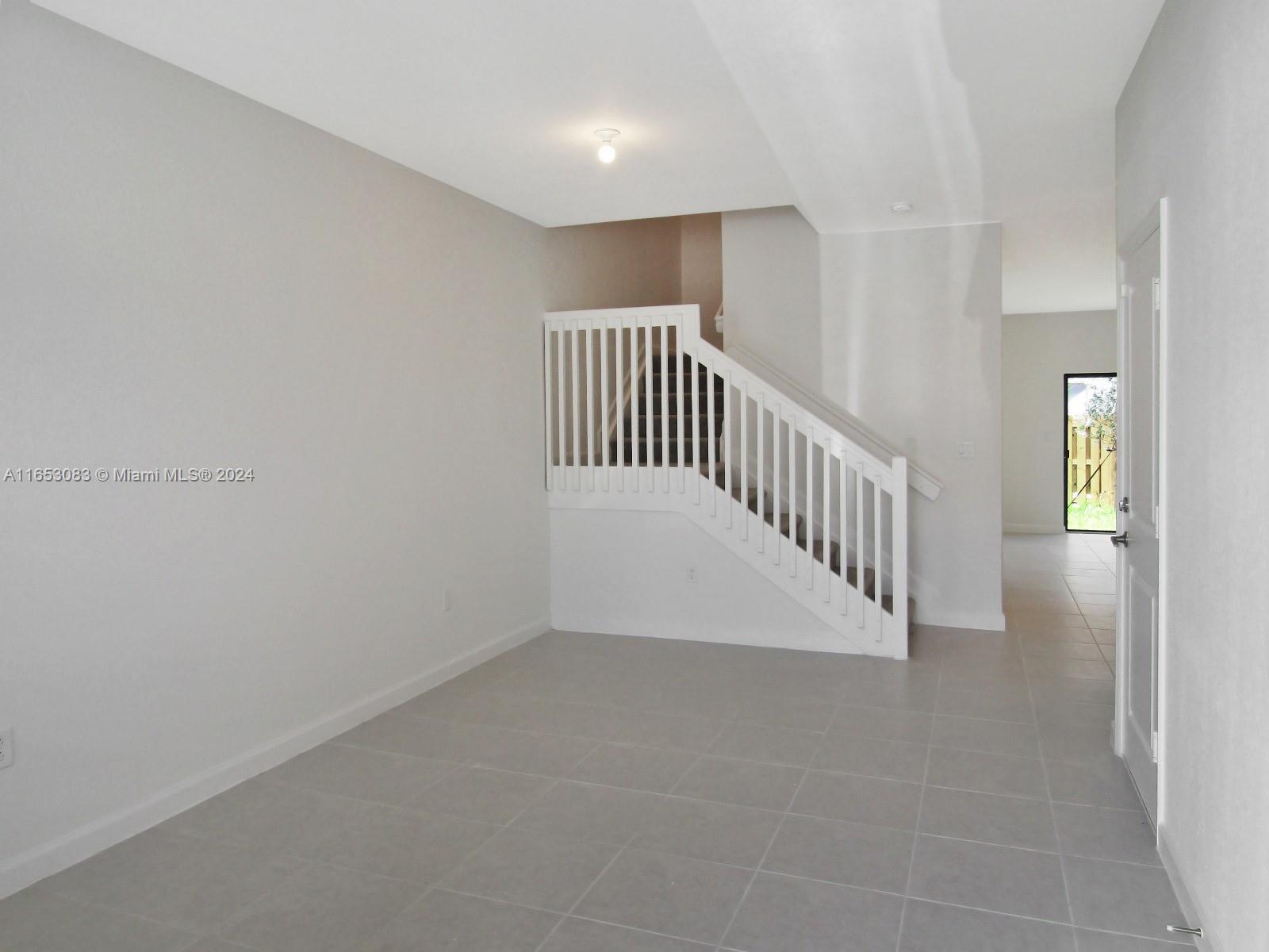 13401 Southwest 287th Street, Unit 13401 Homestead, FL 33033 - Photo 10 of 29 a view of a hallway with entryway