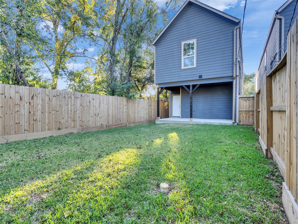 237 Hahlo Street Houston, TX 77020 - Photo 21 of 23 a brick house with a yard plants and large tree