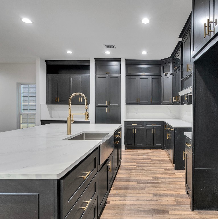 237 Hahlo Street Houston, TX 77020 - Photo 3 of 23 a kitchen with stainless steel appliances granite countertop a sink and stove