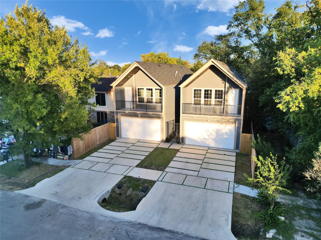 237 Hahlo Street Houston, TX 77020 - Photo 6 of 23 a front view of a house with a yard and trees