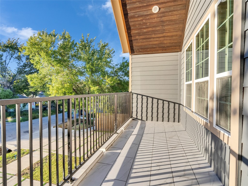 237 Hahlo Street Houston, TX 77020 - Photo 10 of 23 a view of a balcony with wooden floor
