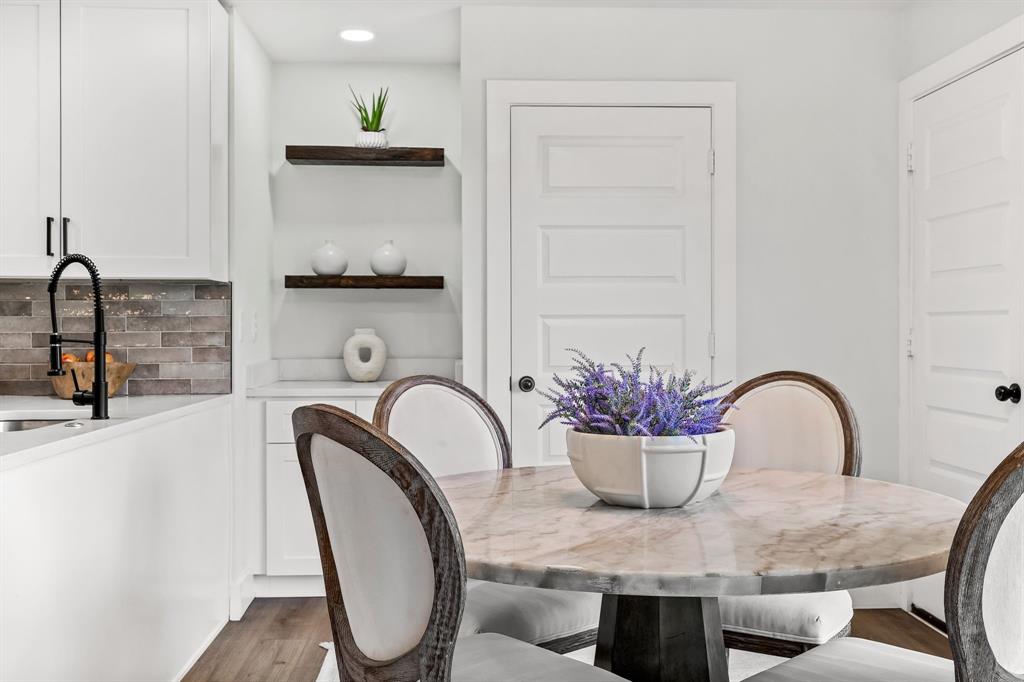 2205 Timberwood Carrollton, TX 75006 - Photo 12 of 32 a dining room with furniture and window