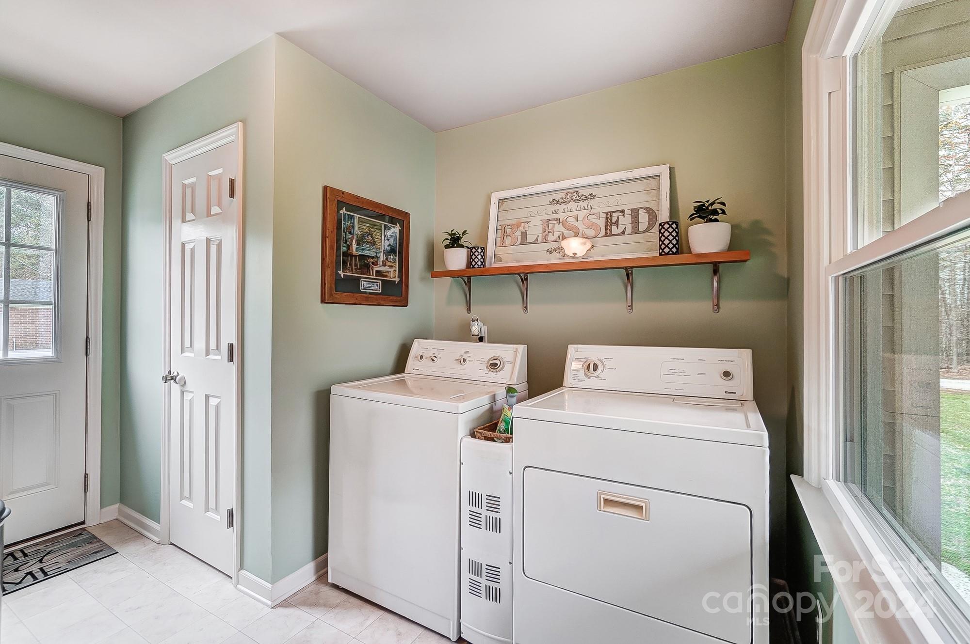 2803 Trinity Church Road Monroe, NC 28112 - Photo 19 of 48 a utility room with dryer and washer