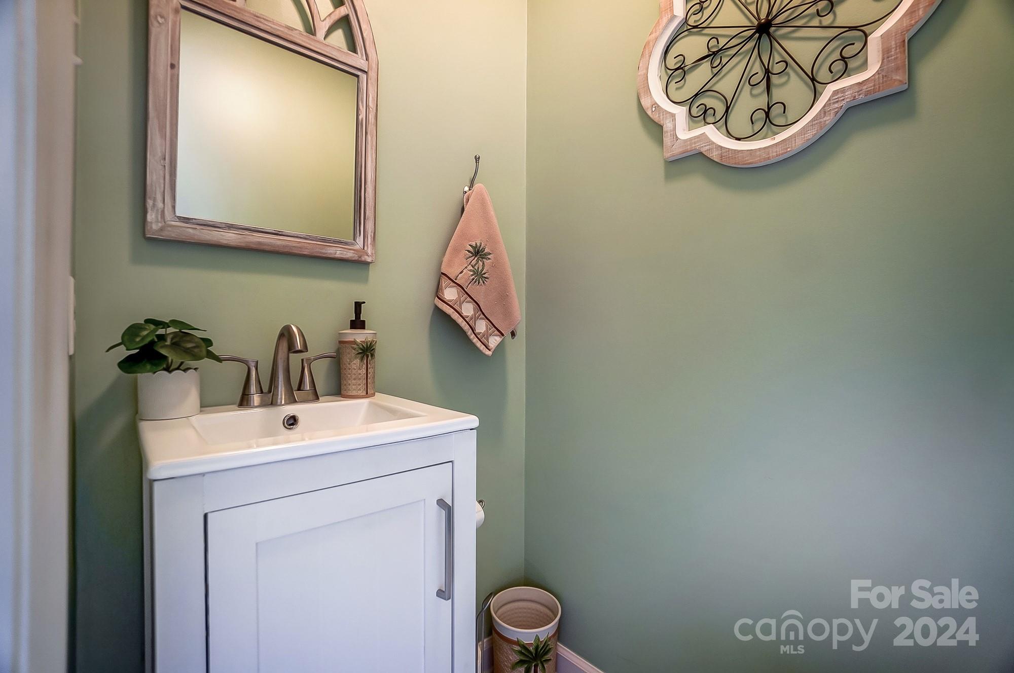 2803 Trinity Church Road Monroe, NC 28112 - Photo 21 of 48 a bathroom with a sink and a mirror