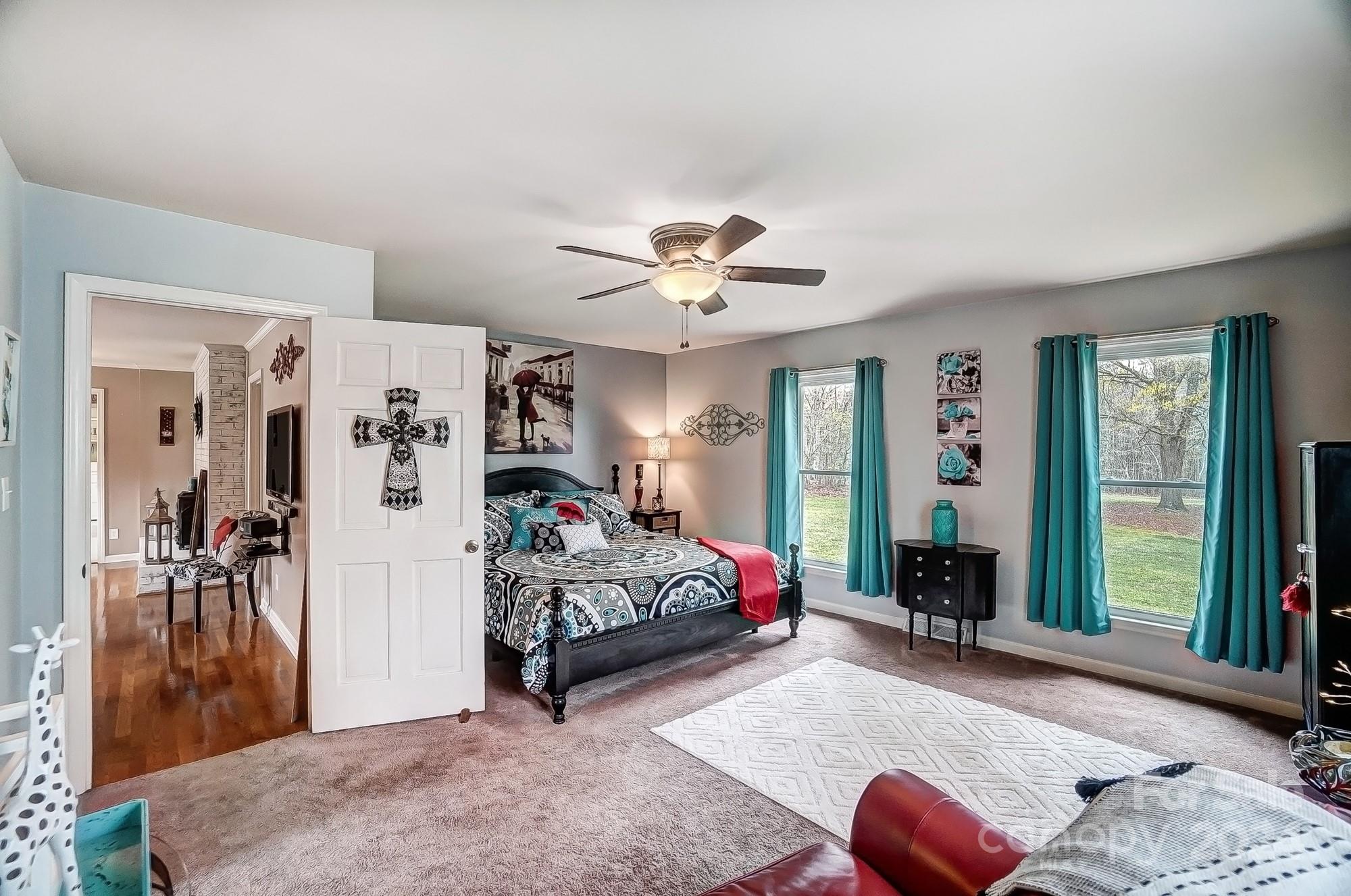 2803 Trinity Church Road Monroe, NC 28112 - Photo 25 of 48 a bedroom with furniture and a large window