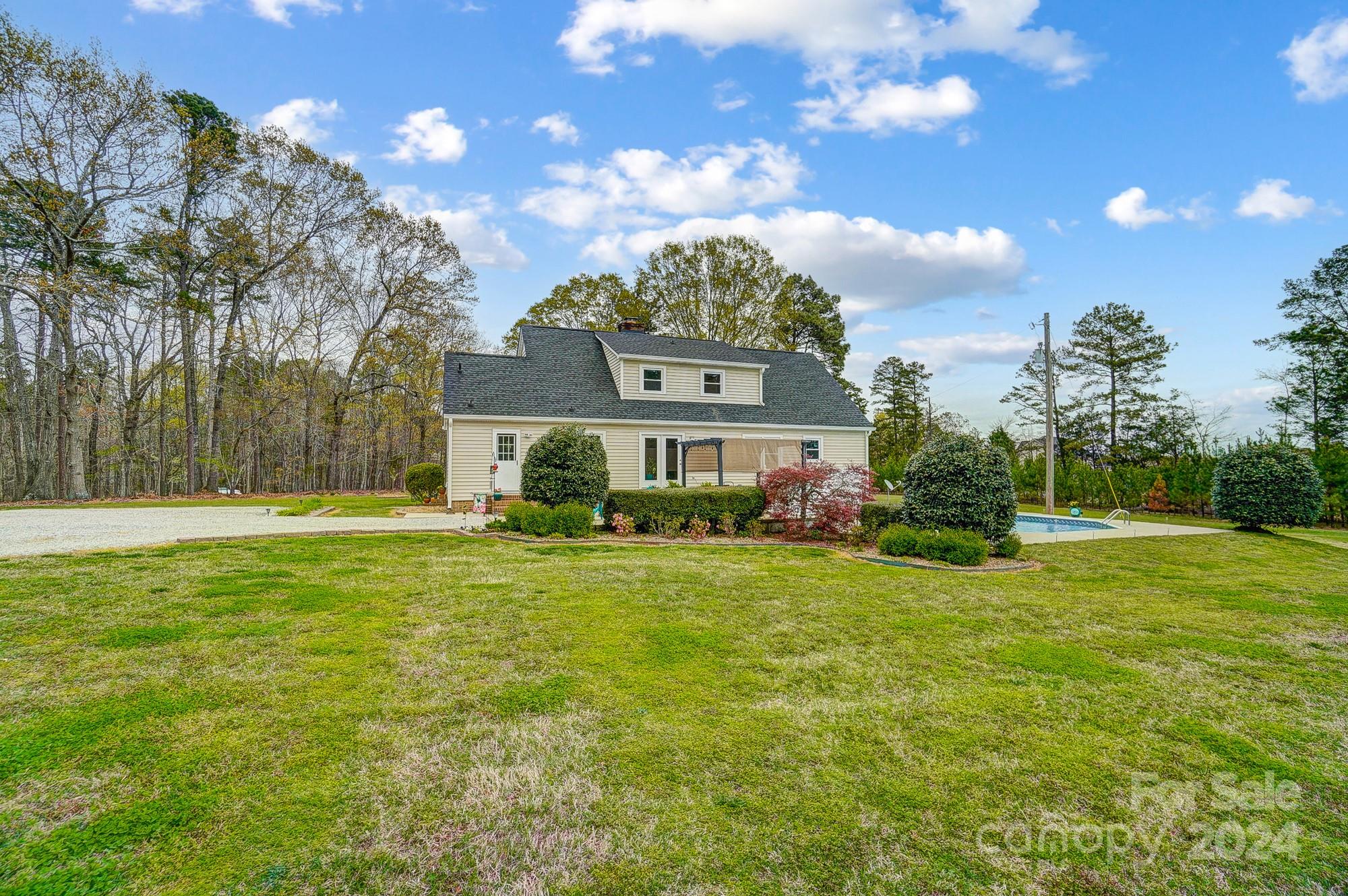 2803 Trinity Church Road Monroe, NC 28112 - Photo 44 of 48 a front view of house with yard and trees