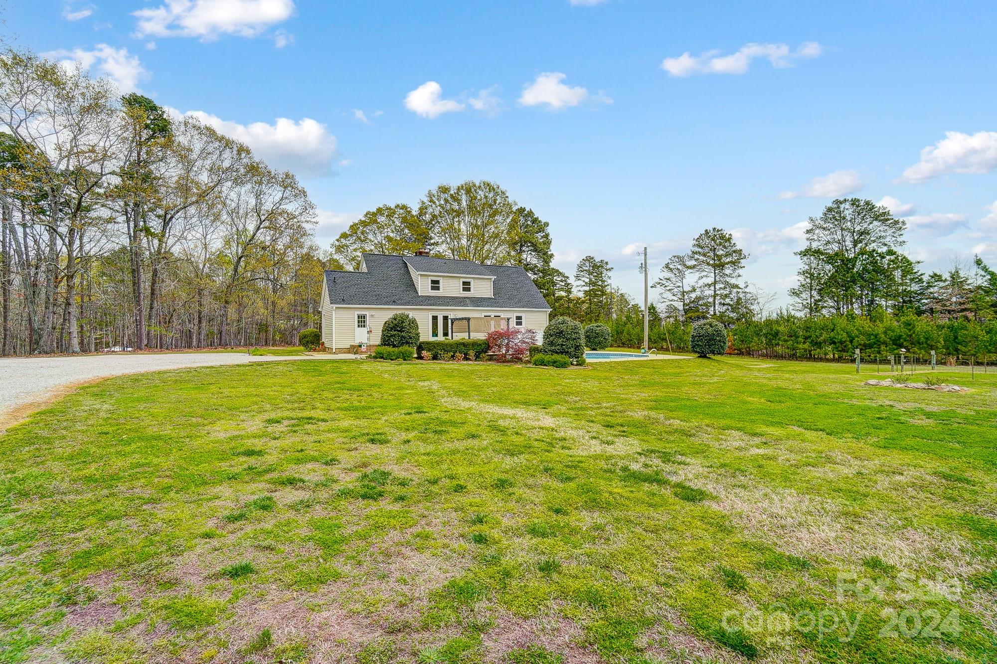 2803 Trinity Church Road Monroe, NC 28112 - Photo 47 of 48 a swimming pool with outdoor seating and yard