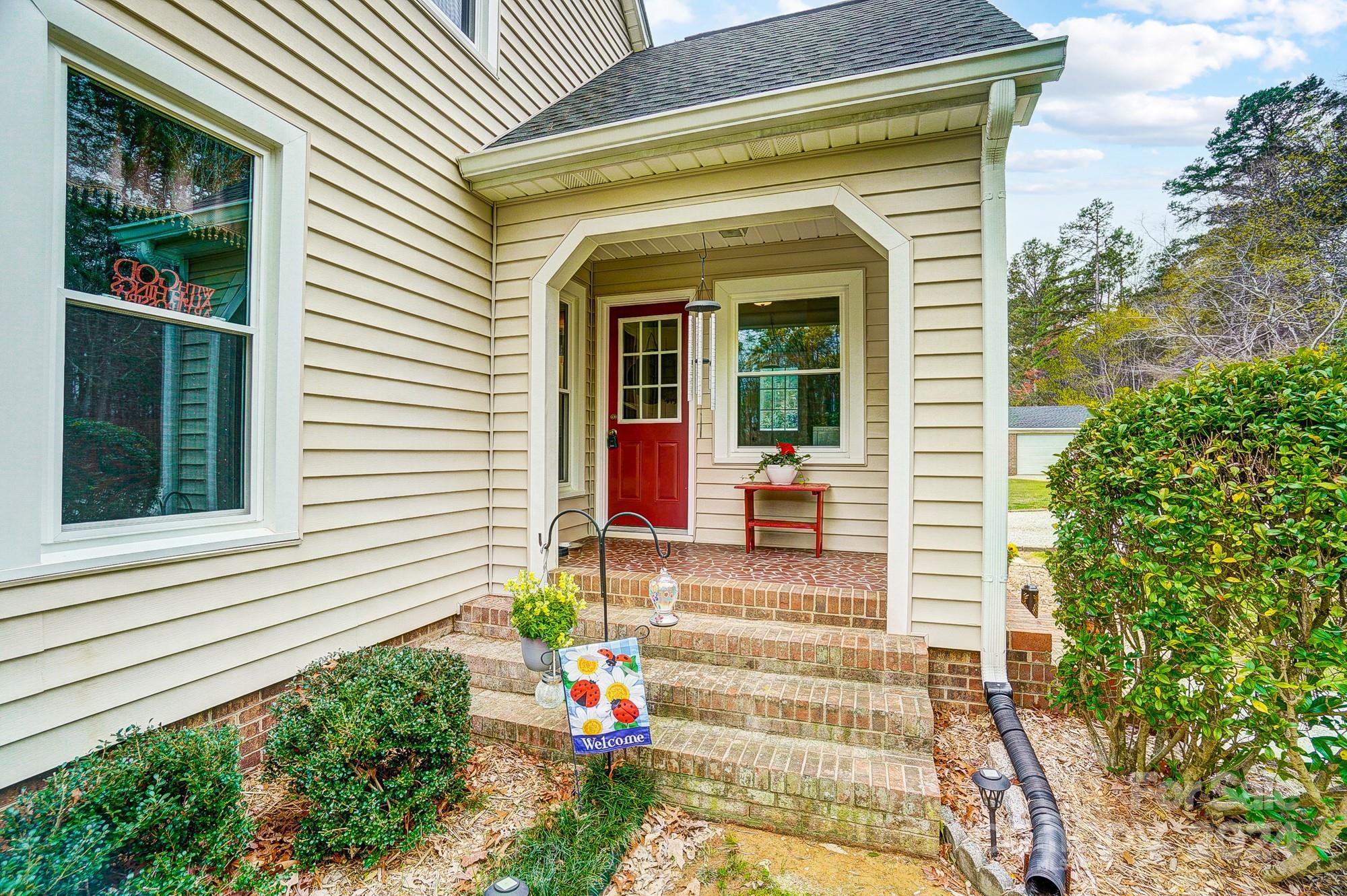 2803 Trinity Church Road Monroe, NC 28112 - Photo 8 of 48 a front view of a house with a porch