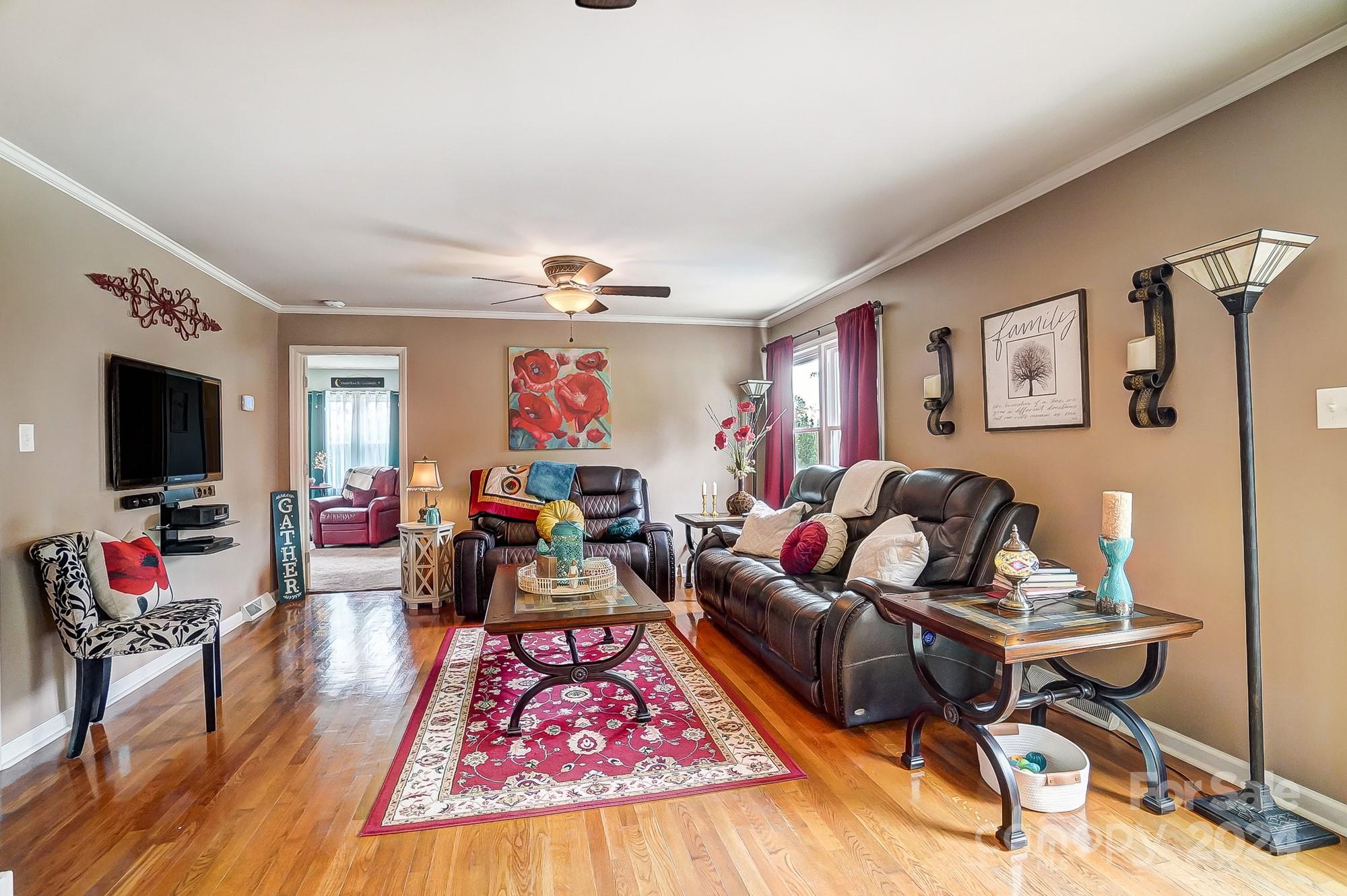 2803 Trinity Church Road Monroe, NC 28112 - Photo 10 of 48 a living room with furniture and a flat screen tv