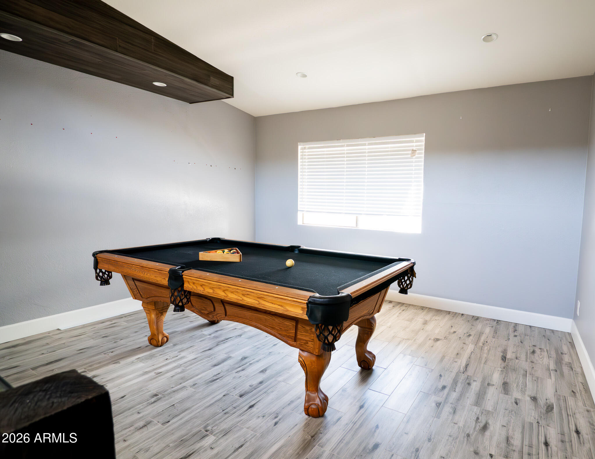 5100 North Miller Road, Unit 3 Scottsdale, AZ 85250 - Photo 15 of 31 a room with wooden floor and pool table