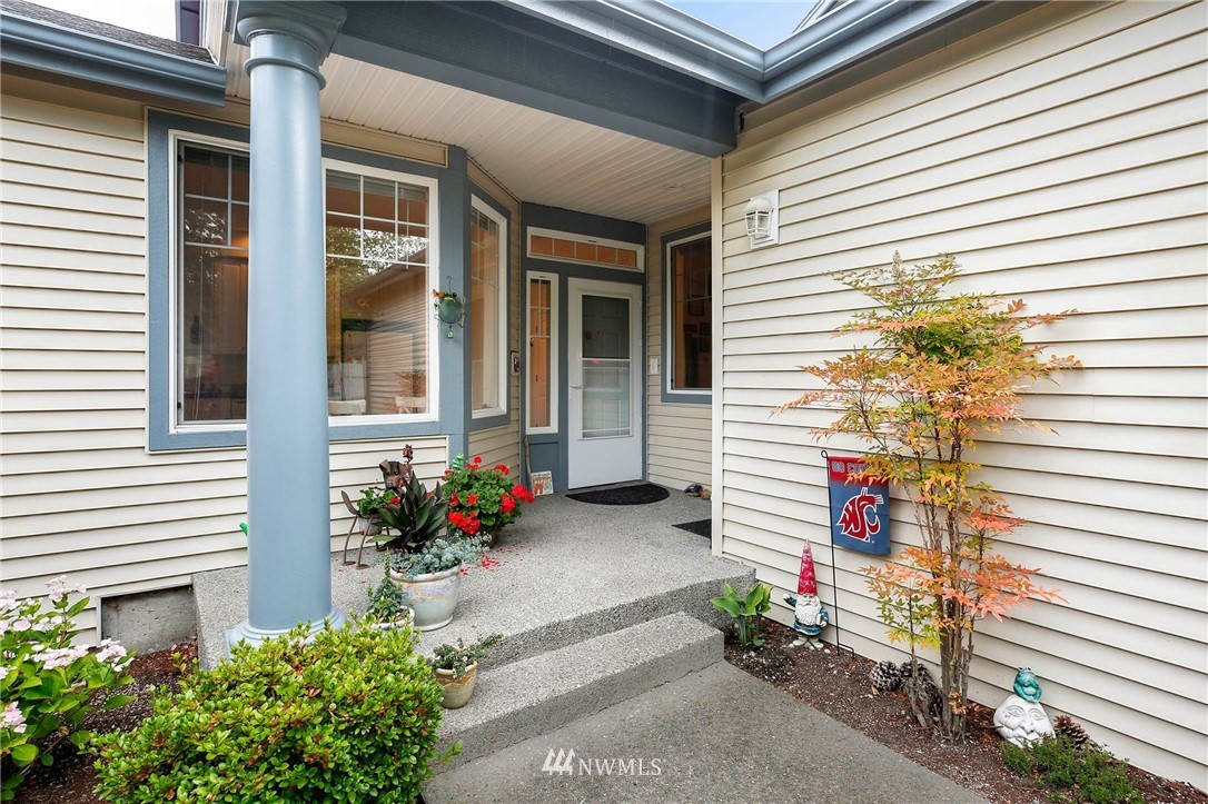4522 Northeast 6th Court Renton, WA 98059 - Photo 3 of 20 a potted plant sitting in front of a house